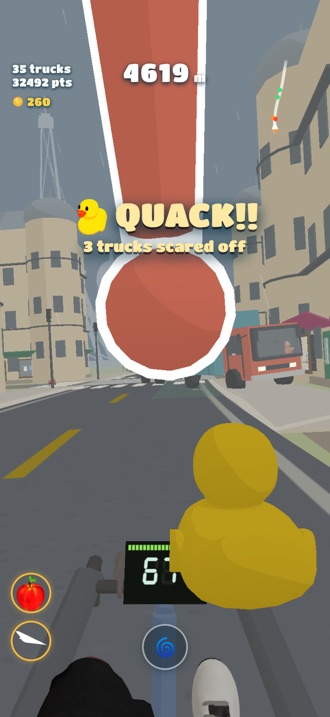 A giant rubber duck scaring three trucks off the road: QUACK!!